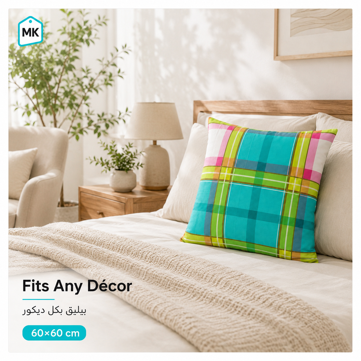 A square decorative throw pillow with a bright plaid pattern in turquoise, green, pink, and yellow, styled on a bed with white bedding and a beige knit blanket. The image includes a logo in the top-left corner and text overlays at the bottom stating 'Fits Any Décor' and '60x60 cm'.